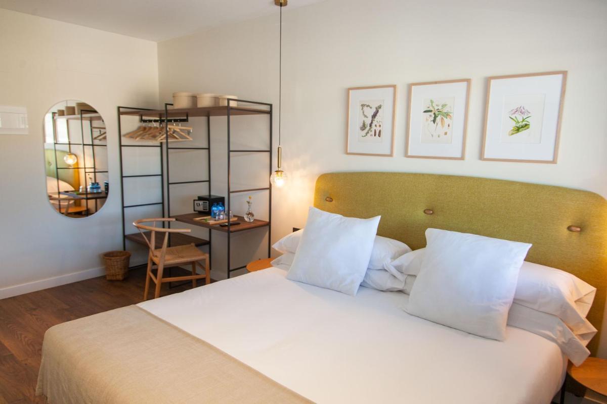 Cama o camas de una habitación en Duruelo Mountain Suites