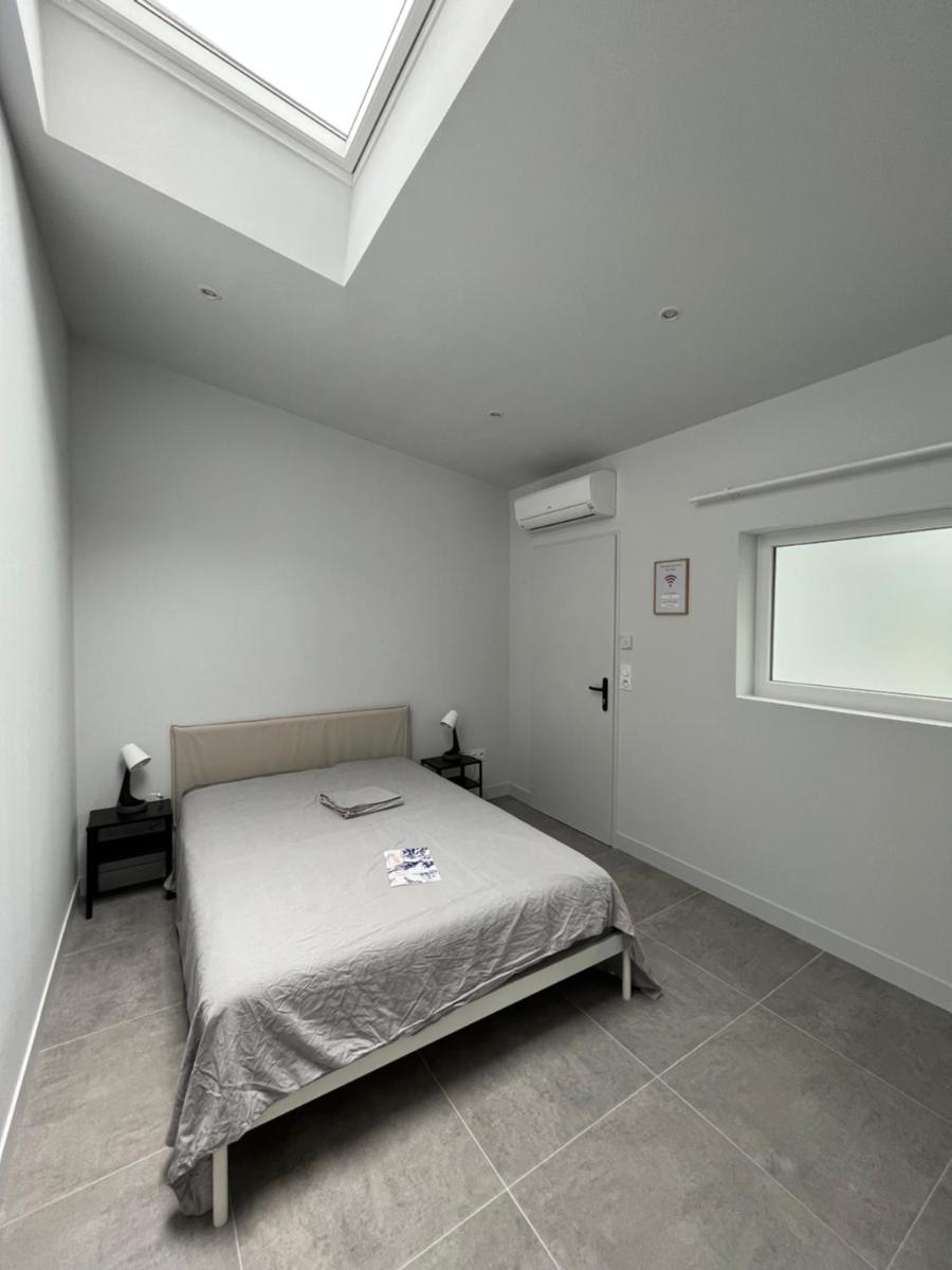 Chez Oma I 1 appartement indépendant OPI I 3 chambres privatives avec salle d eau et salon commun cuisine commune WC commun patio commun - Housity