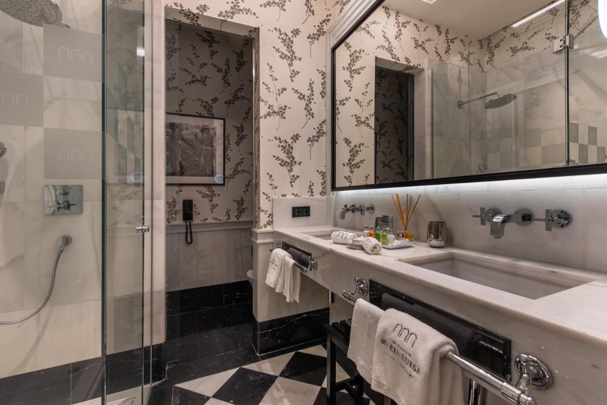 Un baño de Hotel Casa Palacio María Luisa