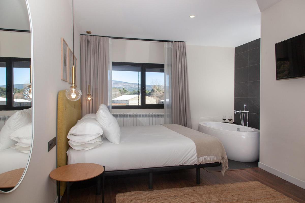 Cama o camas de una habitación en Duruelo Mountain Suites