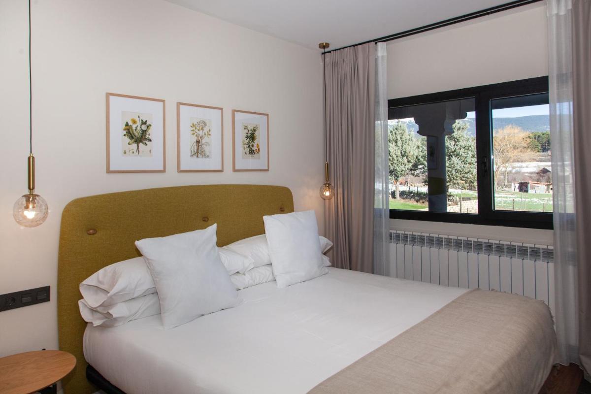 Cama o camas de una habitación en Duruelo Mountain Suites