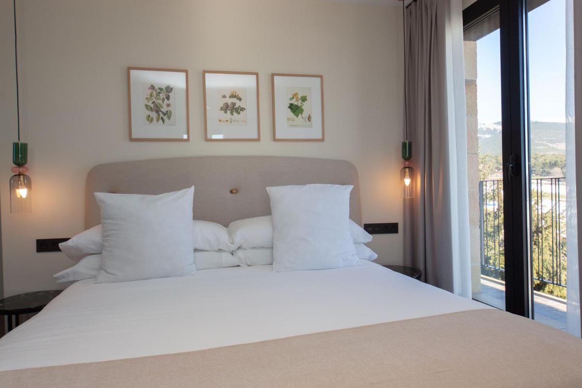 Cama o camas de una habitación en Duruelo Mountain Suites