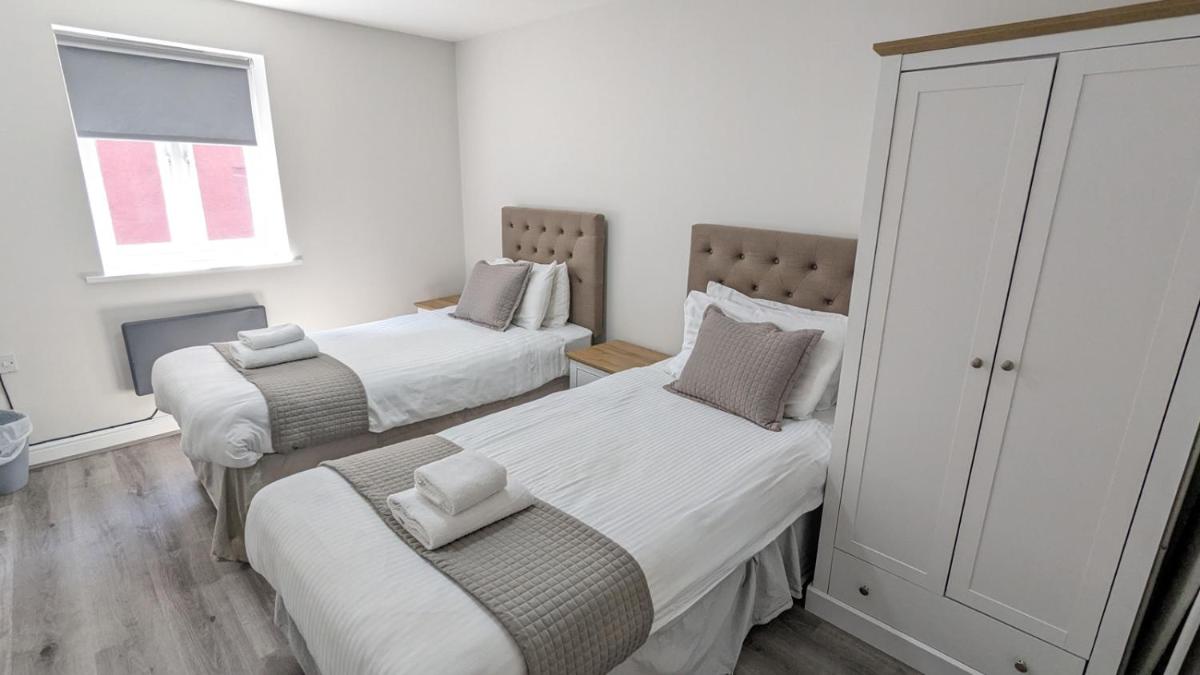 Cocoon @ International Inn + Apartments - Housity