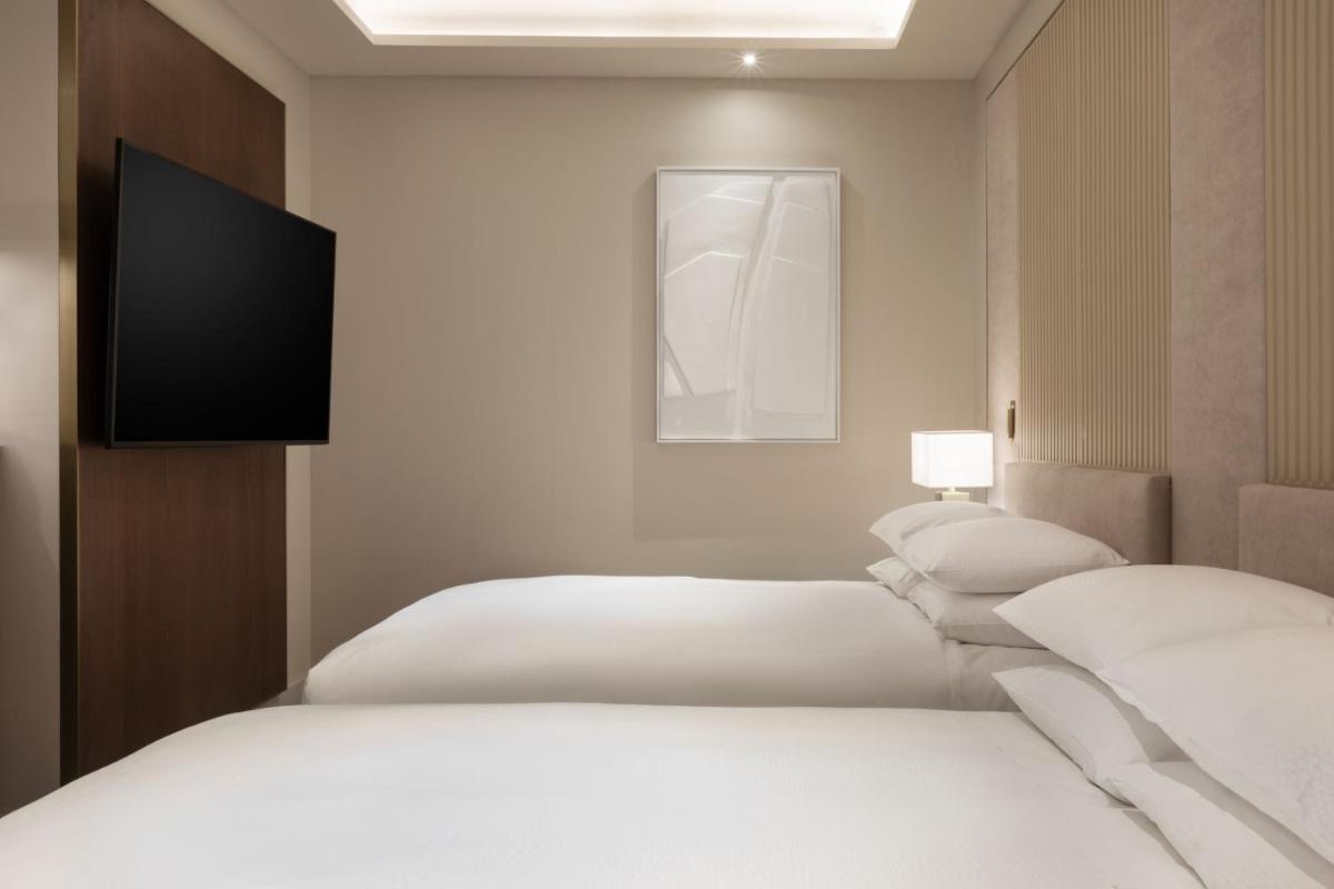 Cama o camas de una habitación en JW Marriott Hotel Madrid