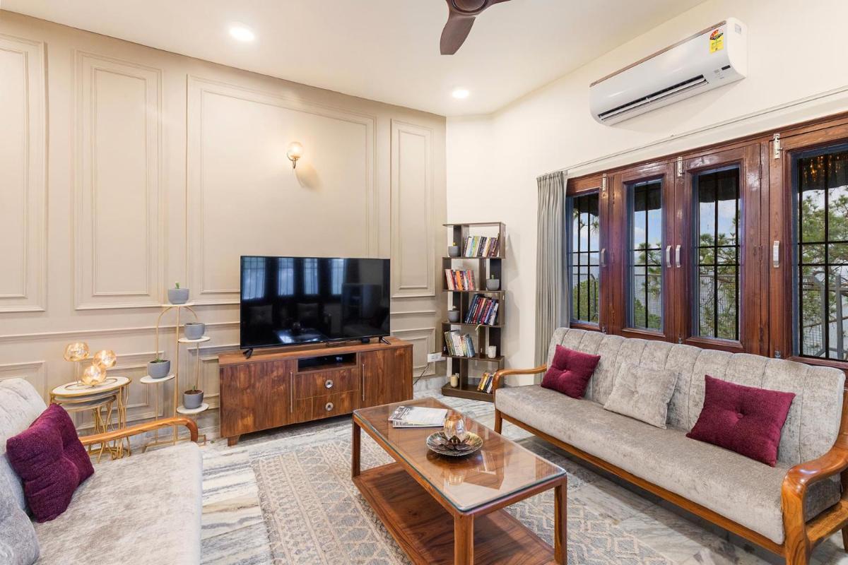 StayVista's L Amore - Hillside Retreat with Mountain & Valley View, Lawn & Indoor-Outdoor Games - Housity