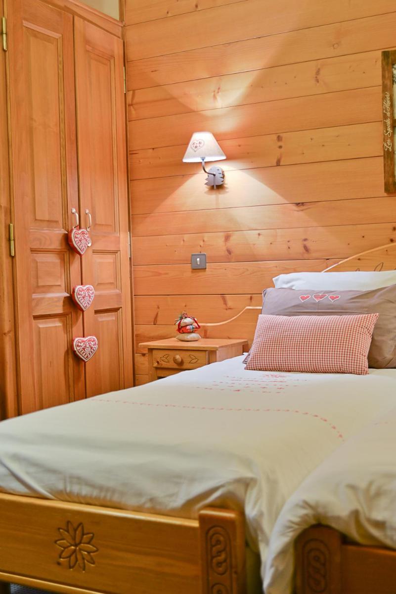 Un ou plusieurs lits dans un hébergement de l'établissement Café-Hôtel Le Morillon, Domaine du Grand Massif-Samoëns