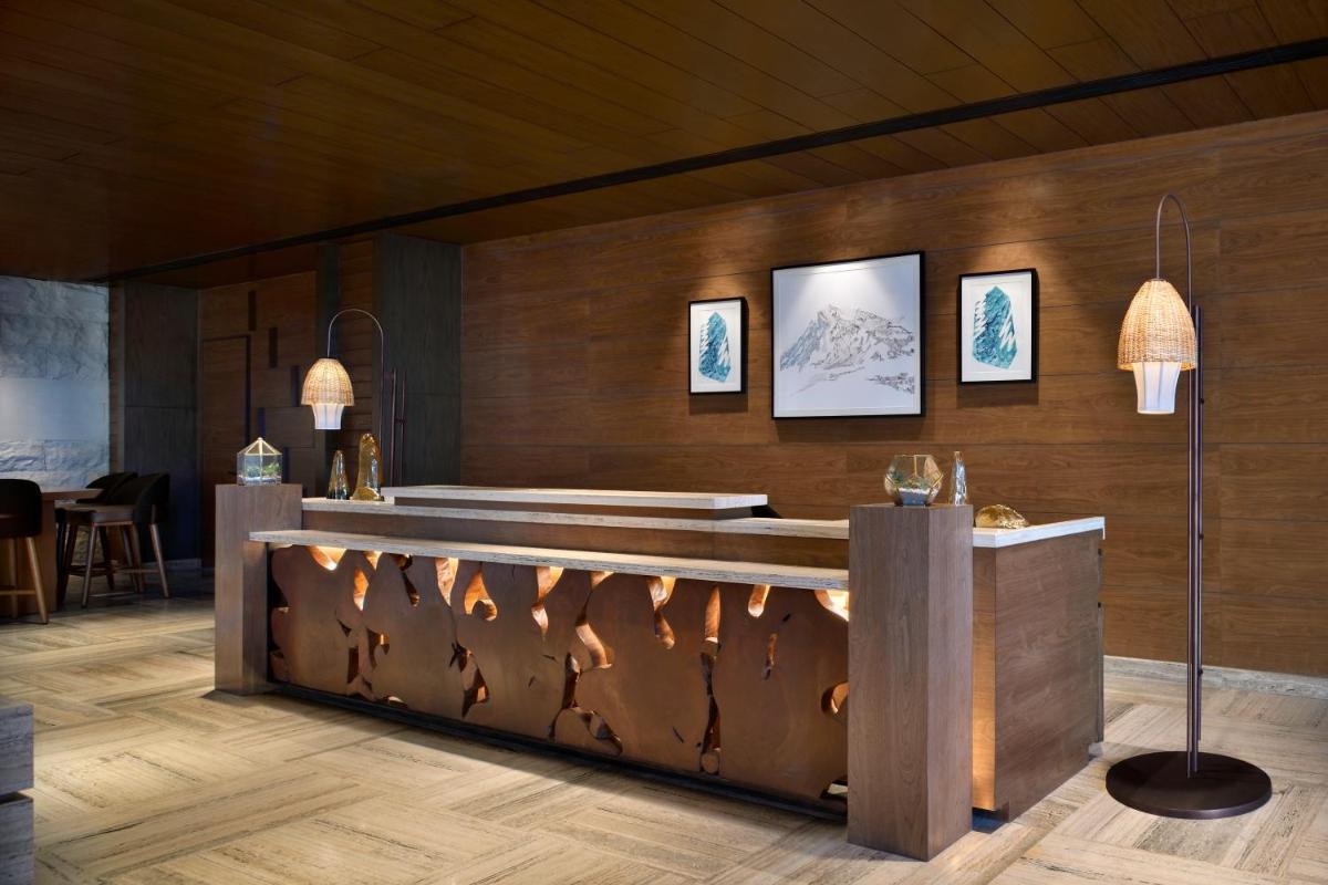 a wellness room with a bathtub and a fireplace at The Westin Resort & Spa Himalayas in Rishīkesh