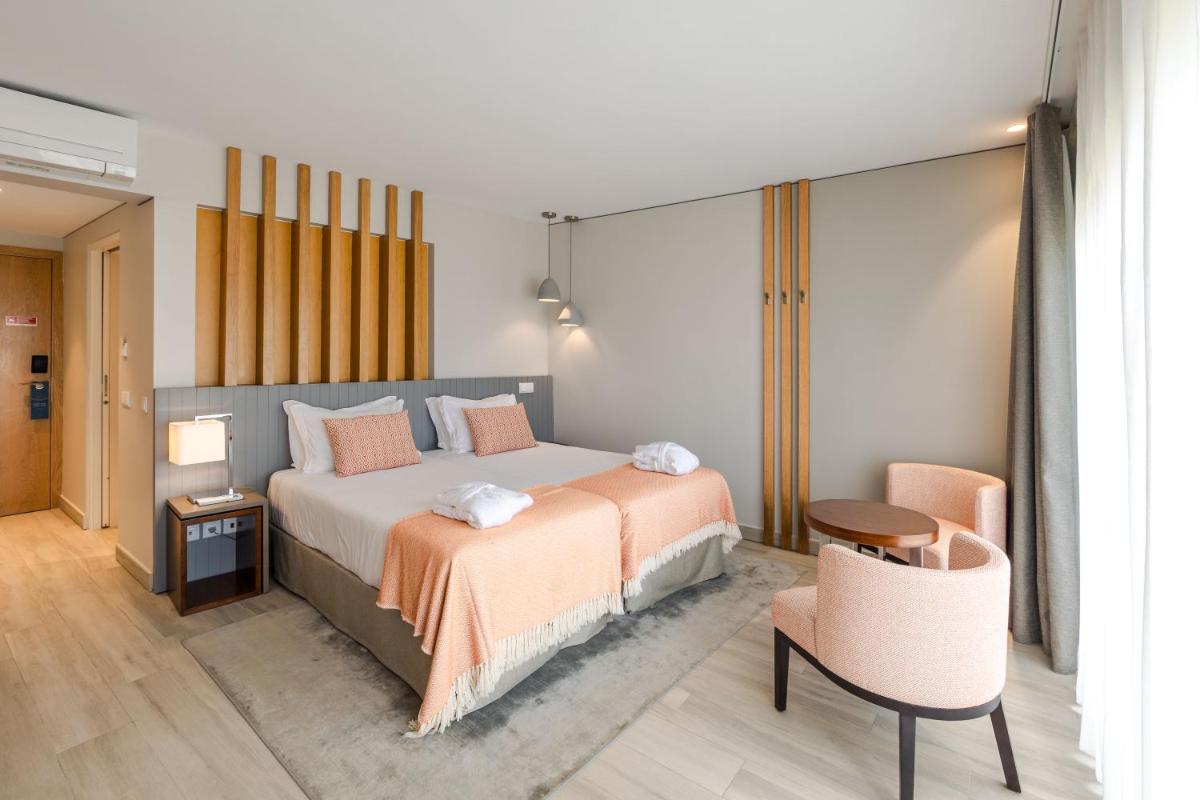 Uma cama ou camas num quarto em Herdade dos Delgados