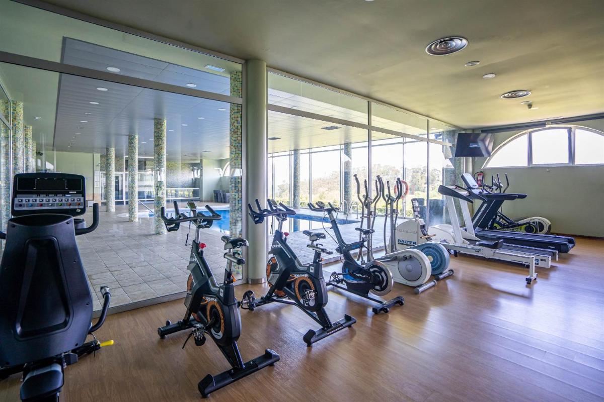 Gimnasio o instalaciones de fitness de Abba Comillas Hotel