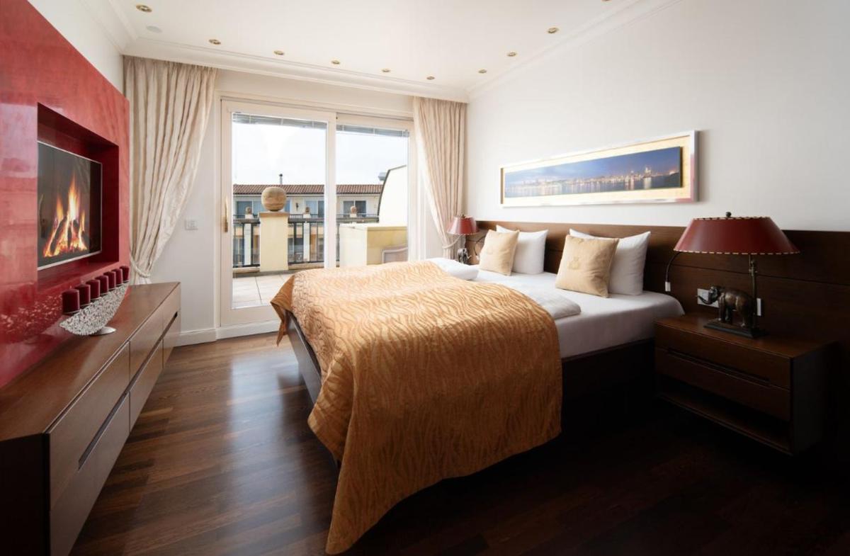 Ein Bett oder Betten in einem Zimmer der Unterkunft Hotel Gran BelVeder & Ostsee Therme Resort & Spa