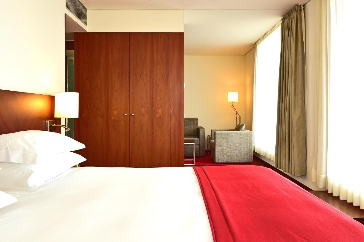 Uma cama ou camas num quarto em Pousada De Viseu