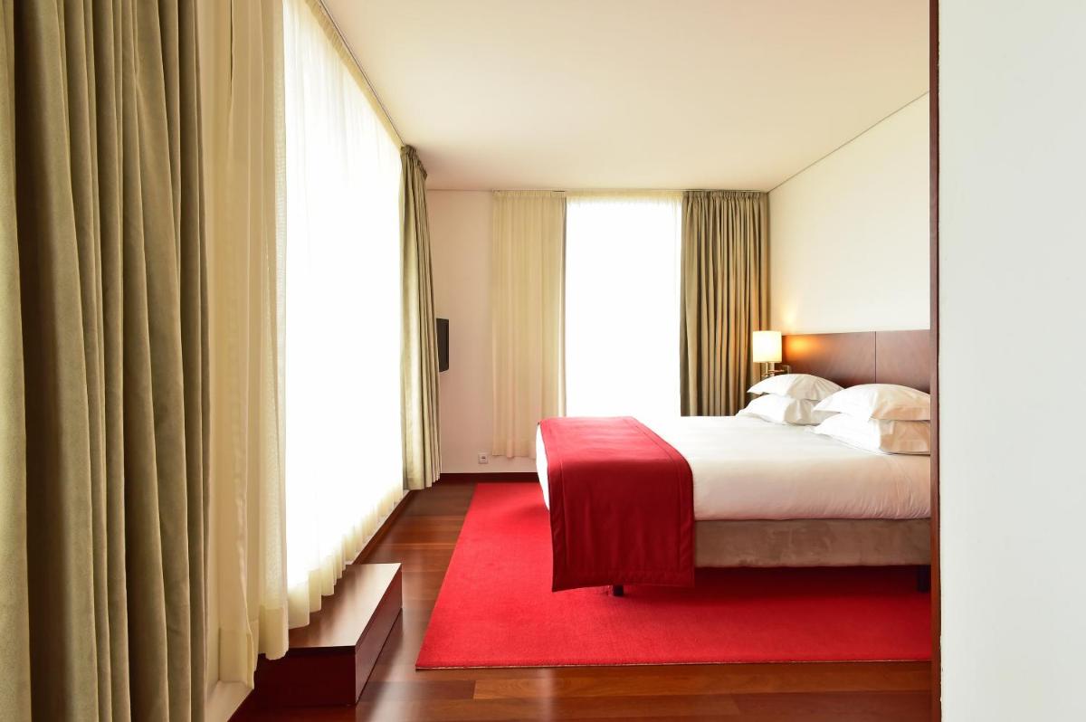 Uma cama ou camas num quarto em Pousada De Viseu