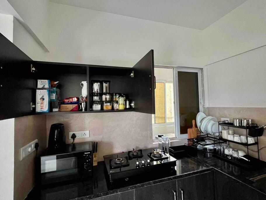 Shangri-la 2BHK Flat near Imagica with Pool - Housity