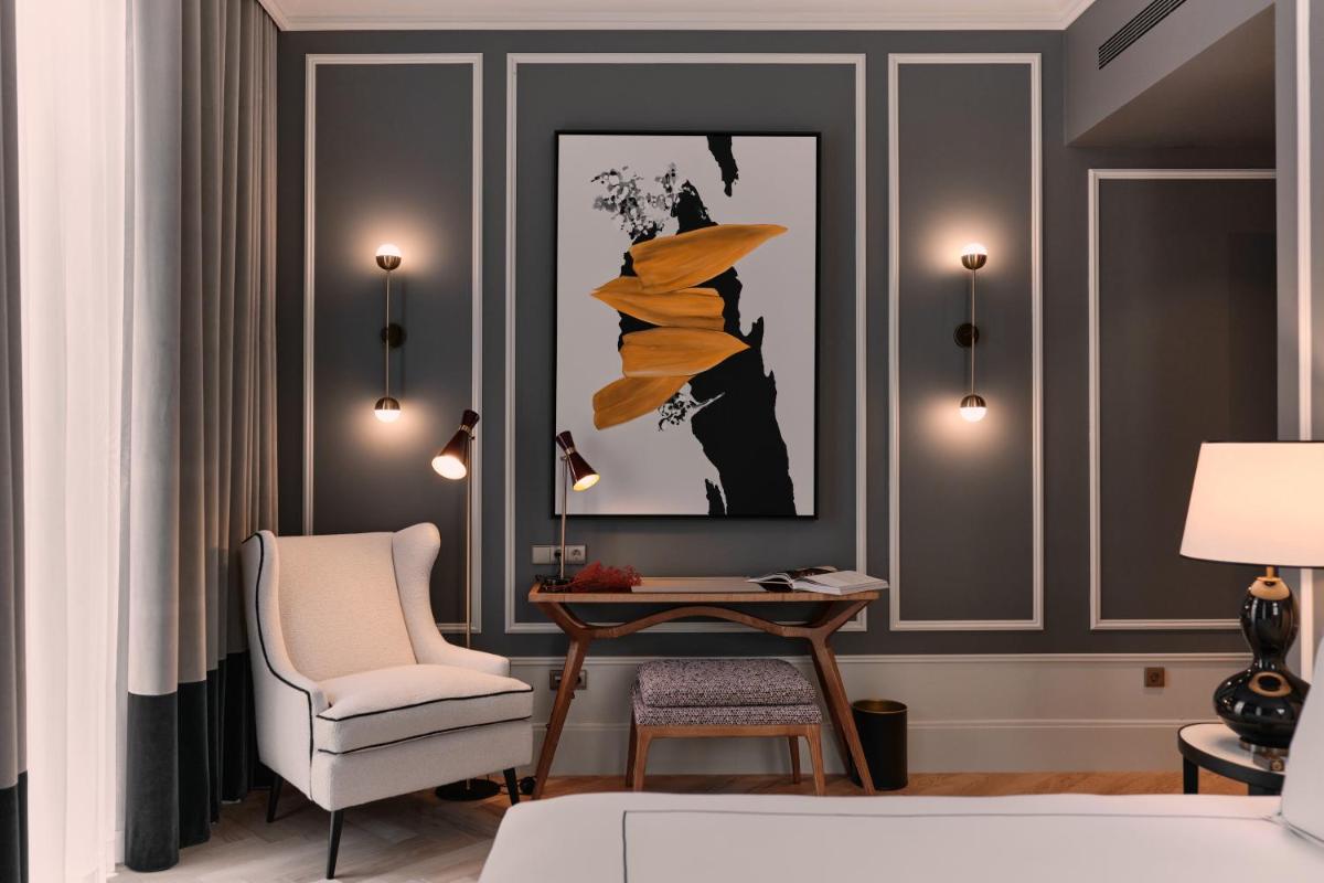 Uma área de estar em GA Palace Hotel & Spa, a XIXth-Century Villa