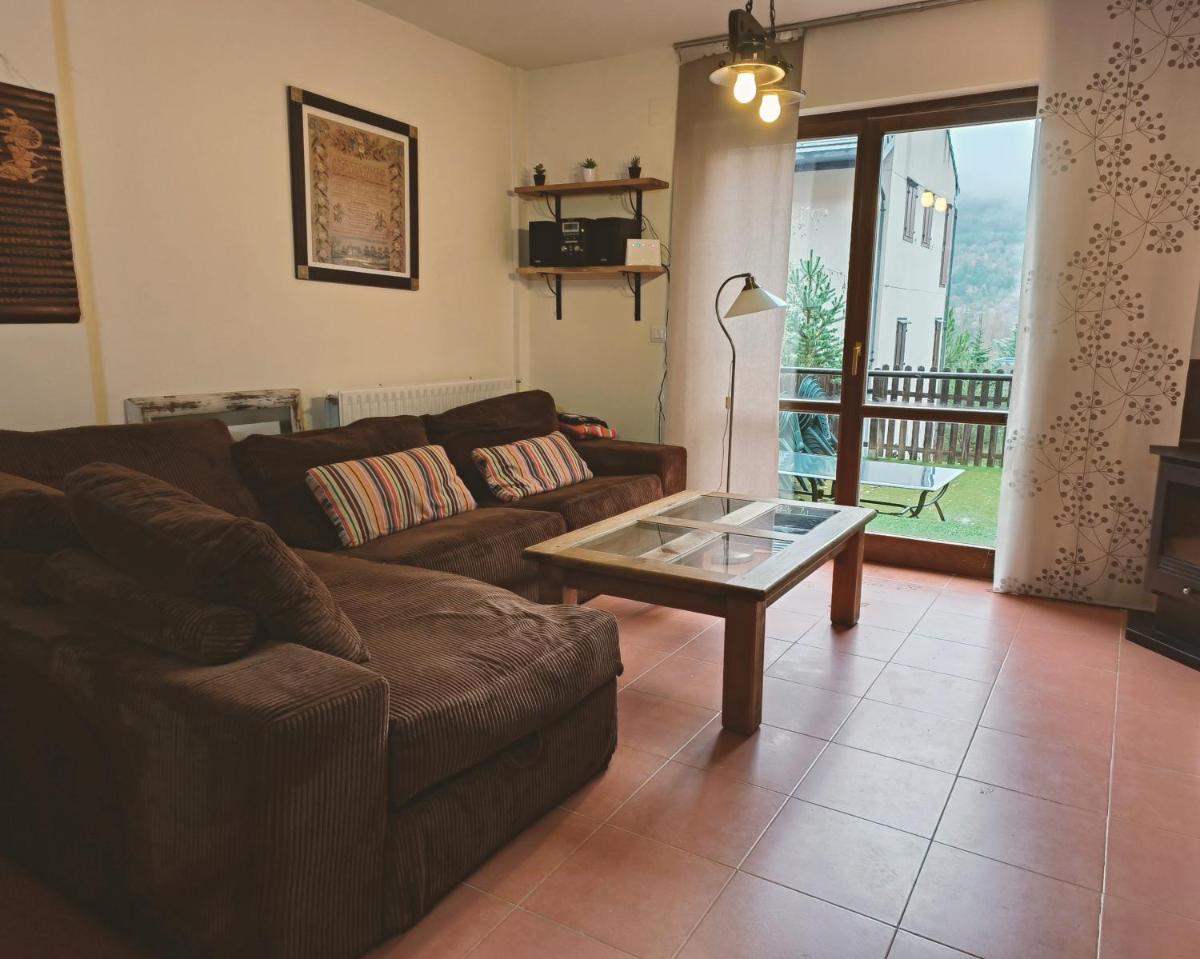 Dúplex con jardín en Pirineos, totalmente equipado - Housity