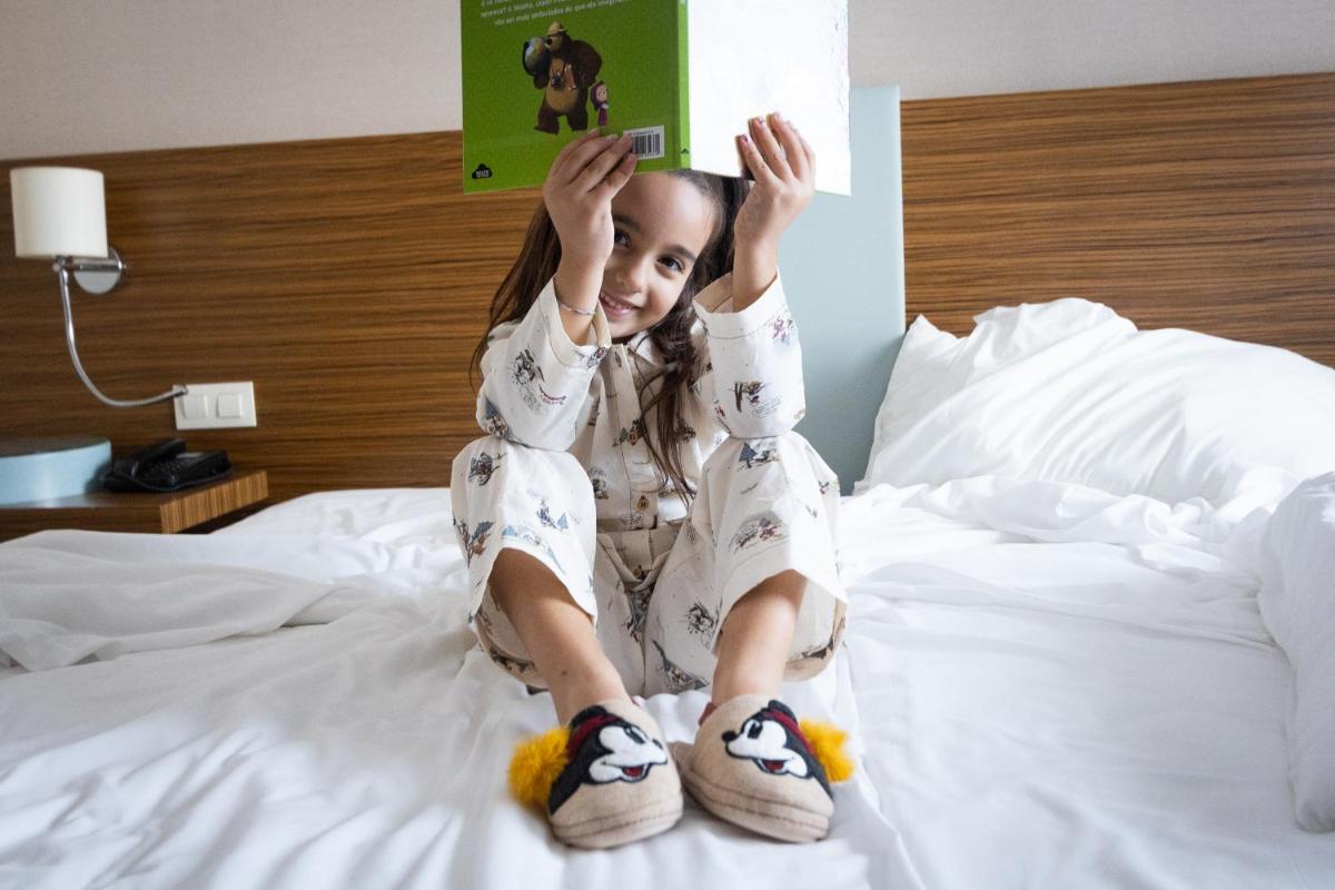 Uma cama ou camas num quarto em Hotel Meira