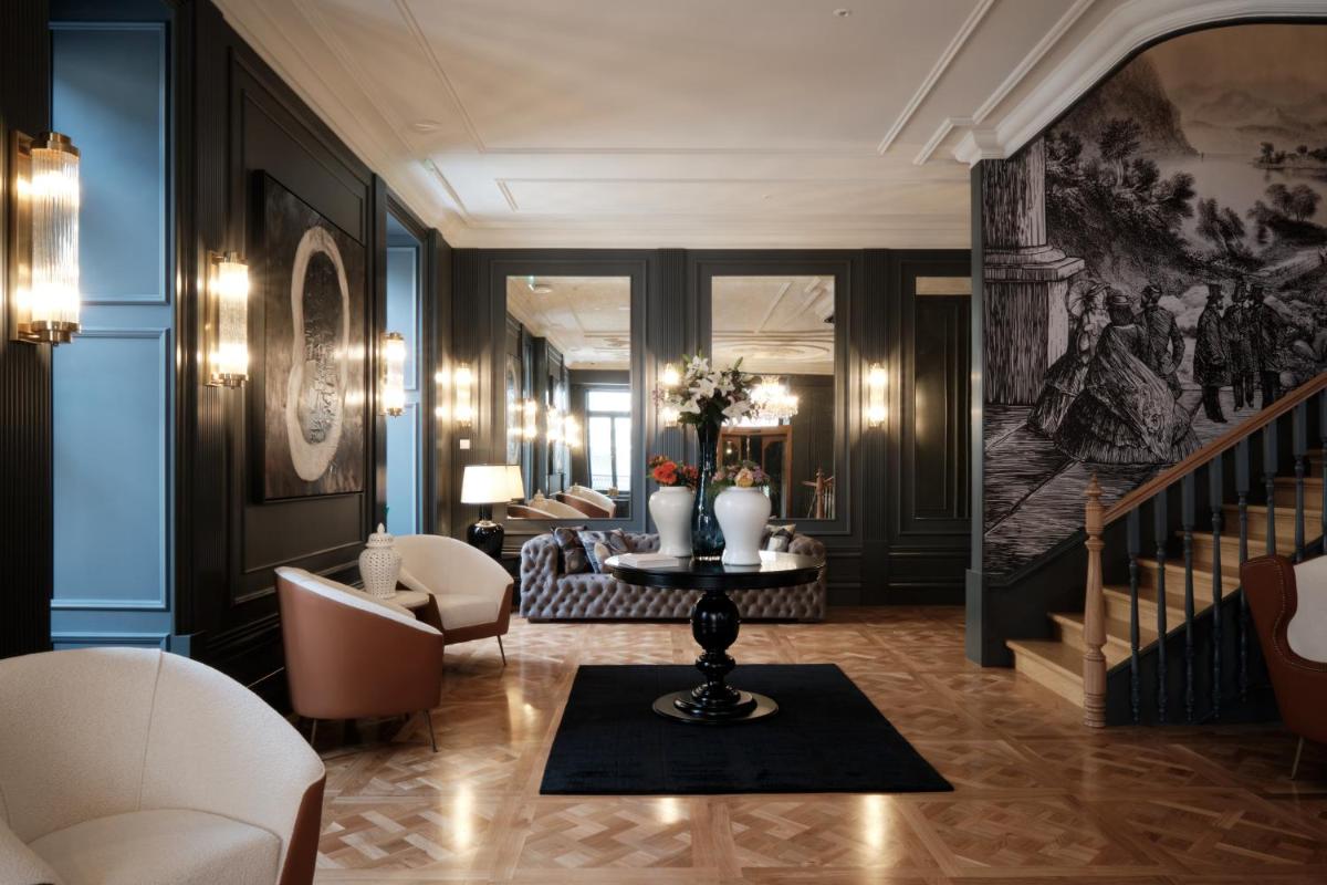 Uma área de estar em GA Palace Hotel & Spa, a XIXth-Century Villa