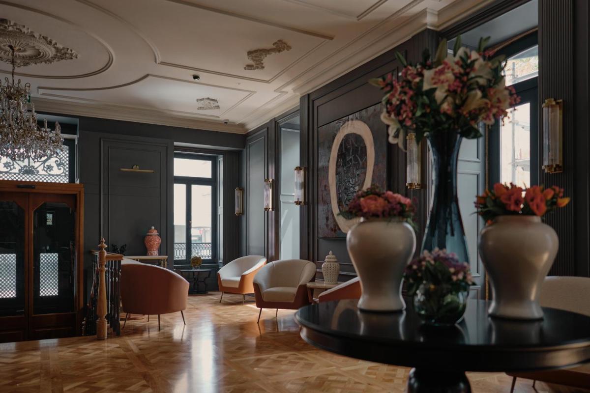 Uma área de estar em GA Palace Hotel & Spa, a XIXth-Century Villa