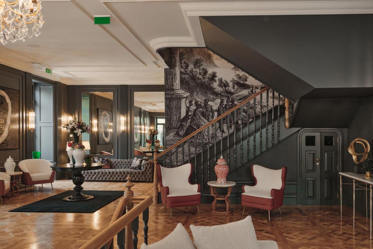 Uma área de estar em GA Palace Hotel & Spa, a XIXth-Century Villa