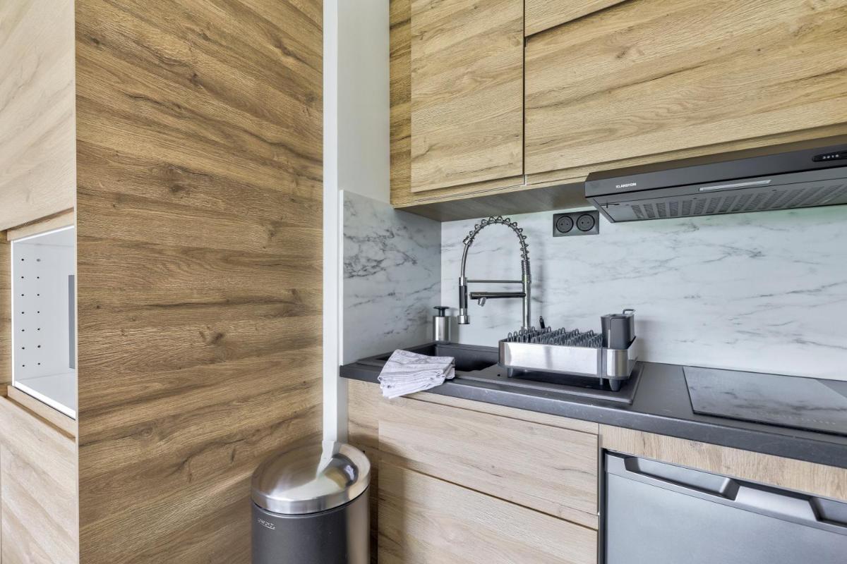 Cuisine ou kitchenette dans l'établissement La Parenthèse Enchantée