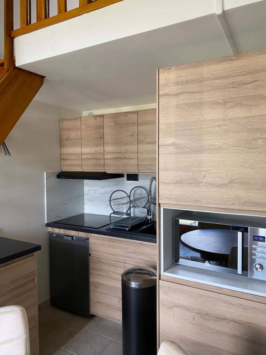 Cuisine ou kitchenette dans l'établissement La Parenthèse Enchantée