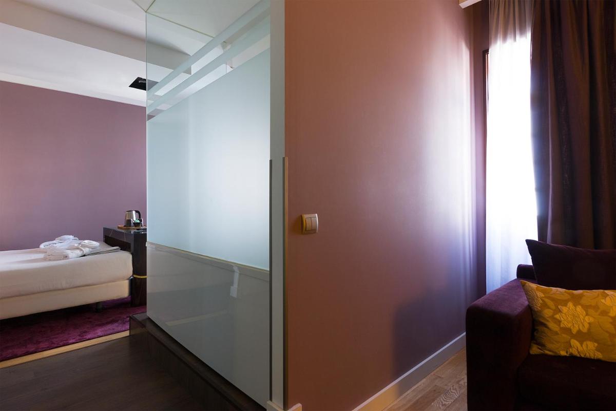 Uma cama ou camas num quarto em Hotel Meira