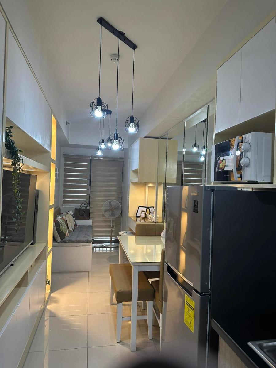 Mel and Rose Place in S Residences Tower 1 MOA - Housity
