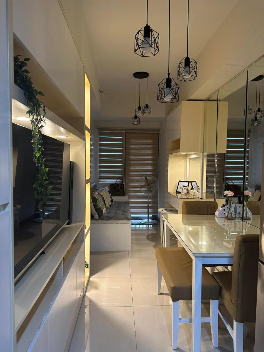 Mel and Rose Place in S Residences Tower 1 MOA - Housity