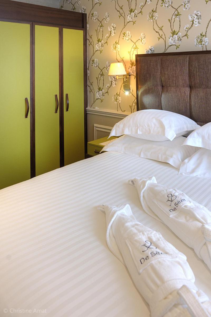Un ou plusieurs lits dans un hébergement de l'établissement Hôtel de Sèze & Spa Bordeaux Centre