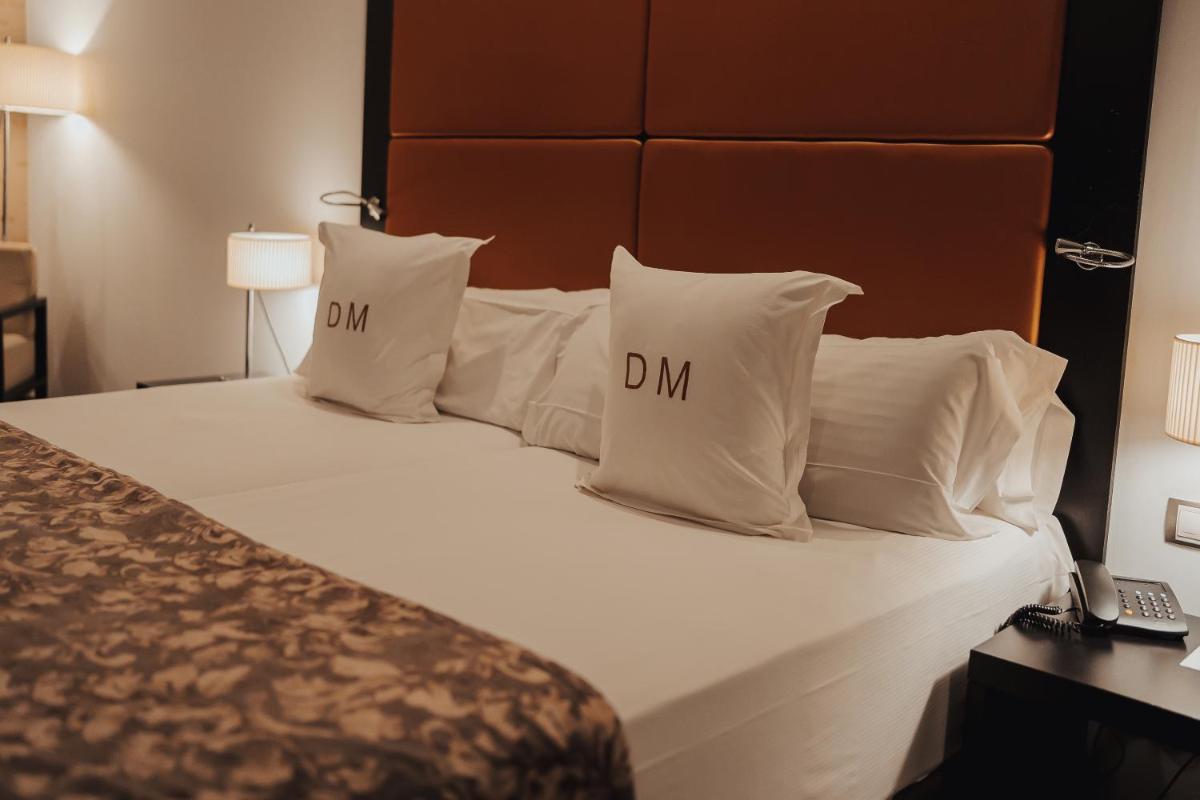 Cama o camas de una habitación en Gran Hotel Don Manuel