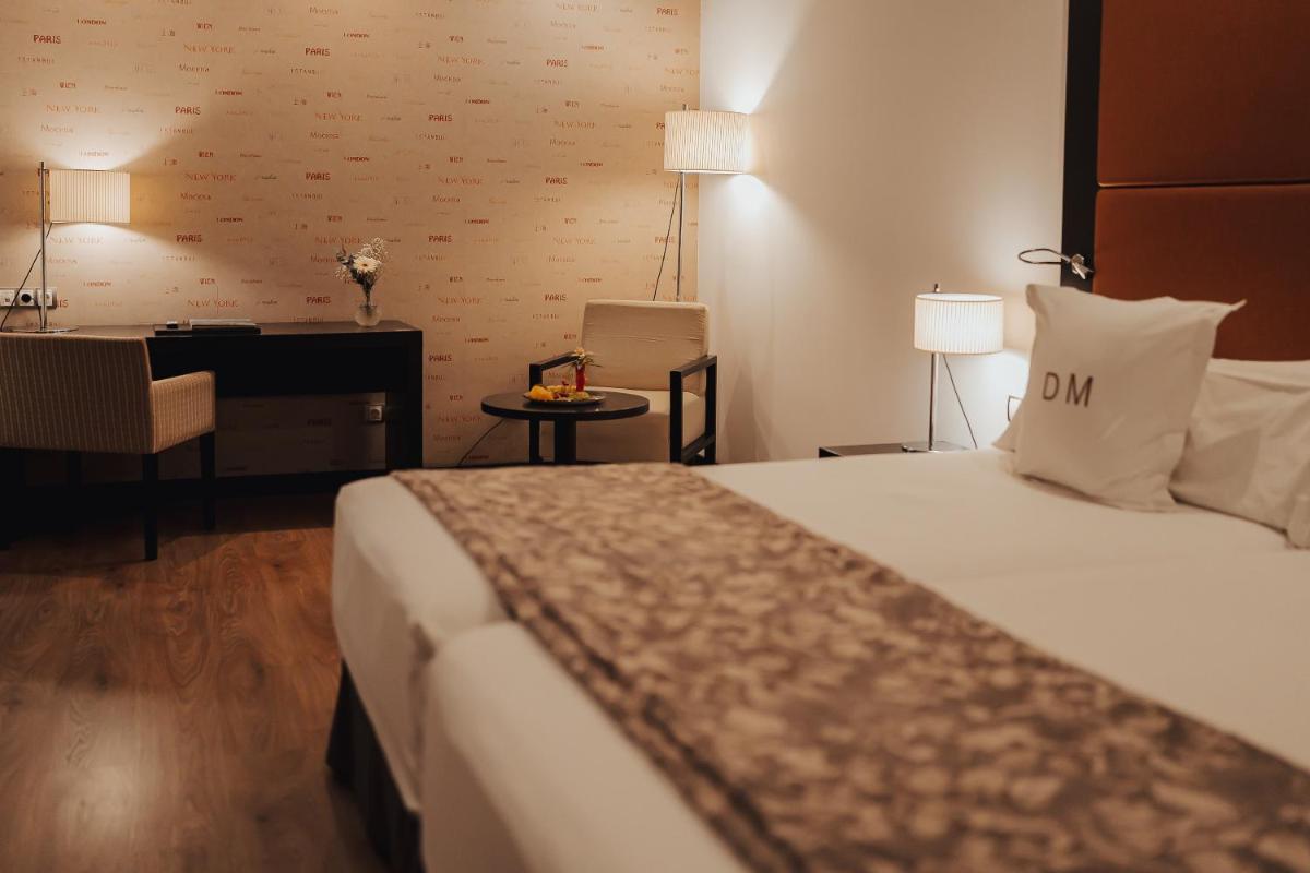 Cama o camas de una habitación en Gran Hotel Don Manuel