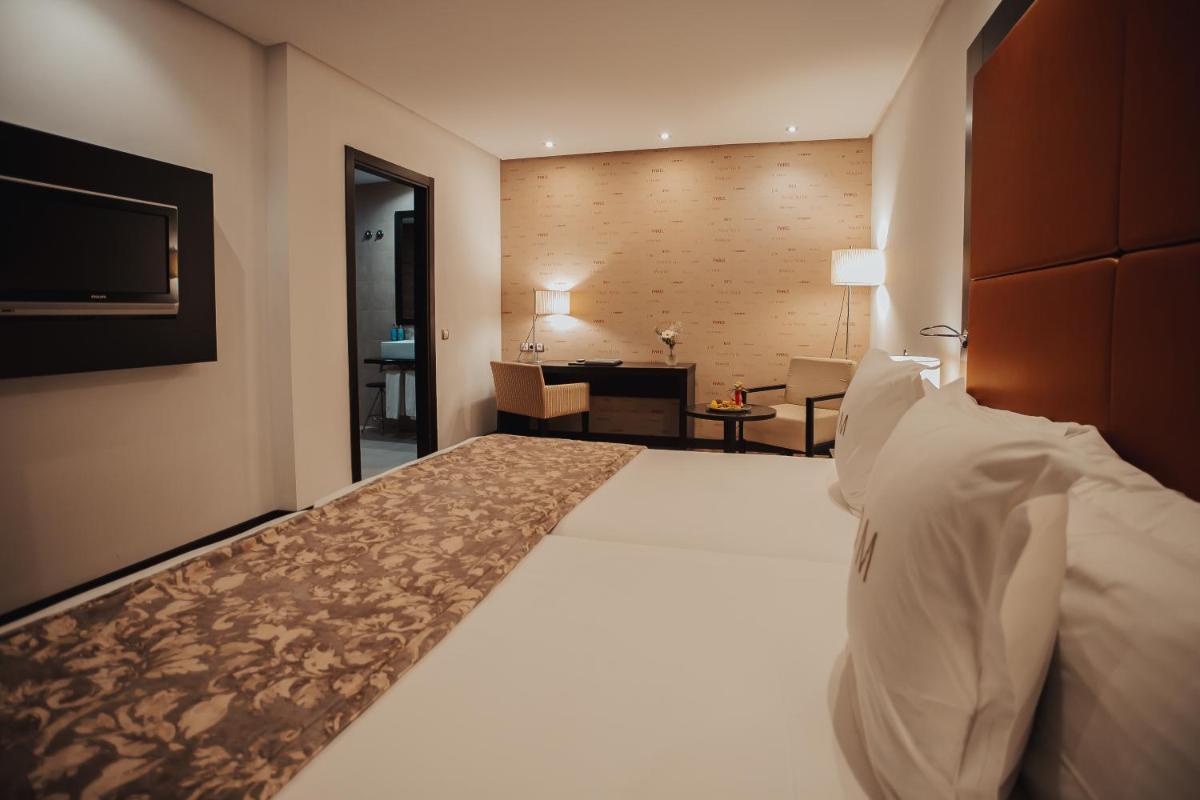 Cama o camas de una habitación en Gran Hotel Don Manuel