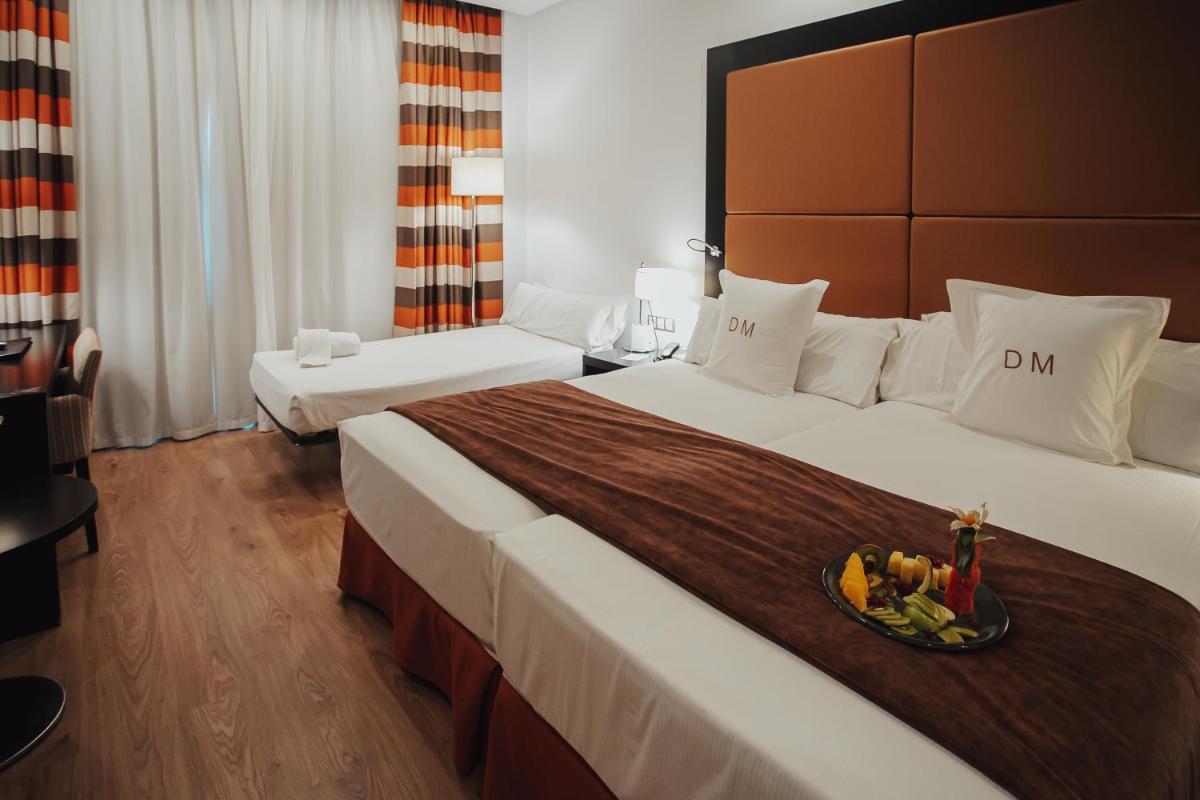 Cama o camas de una habitación en Gran Hotel Don Manuel