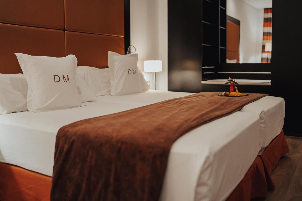 Cama o camas de una habitación en Gran Hotel Don Manuel