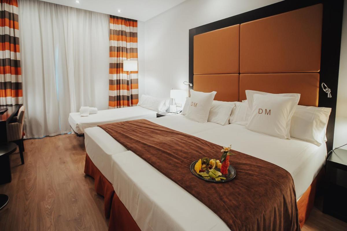 Cama o camas de una habitación en Gran Hotel Don Manuel