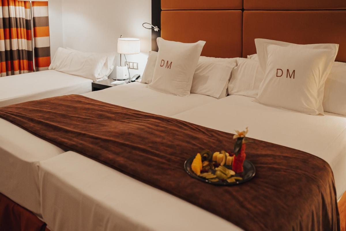 Cama o camas de una habitación en Gran Hotel Don Manuel