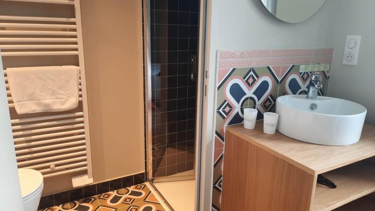 Salle de bains dans l'établissement Hotel Trinquet