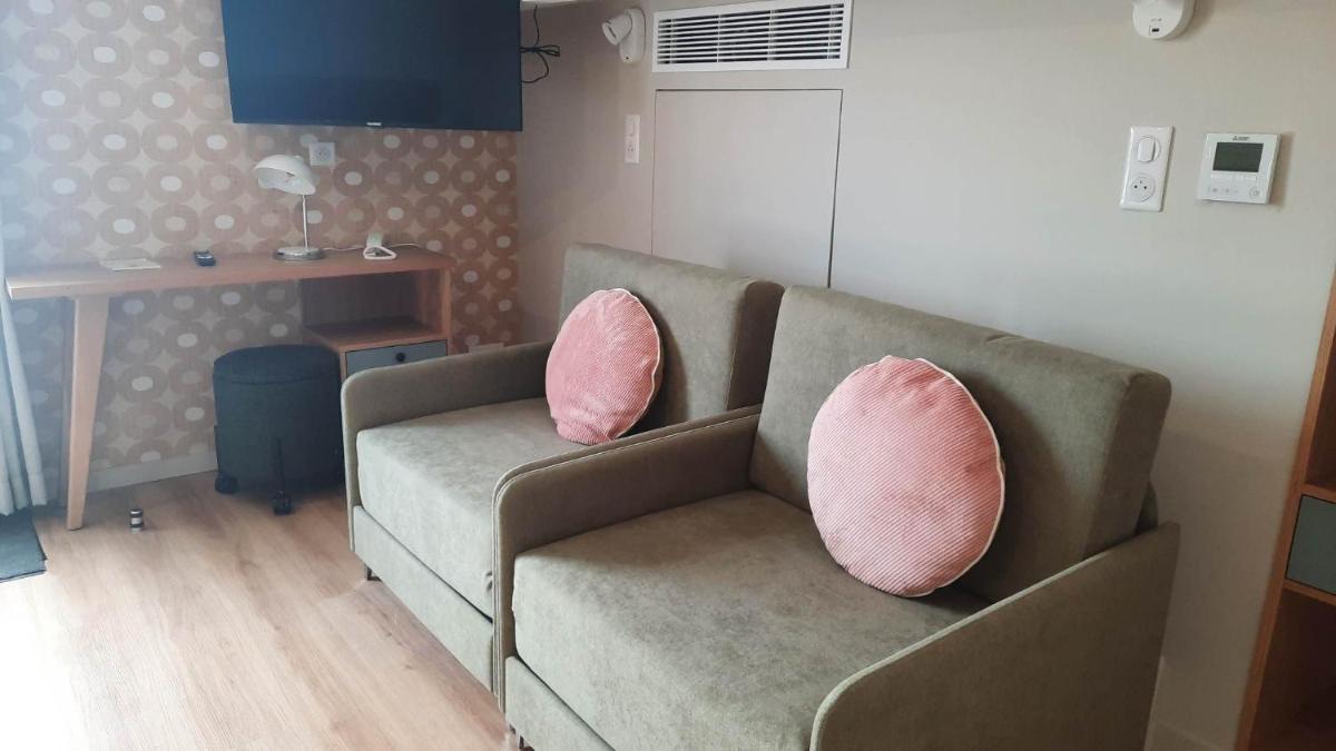 Coin salon dans l'établissement Hotel Trinquet
