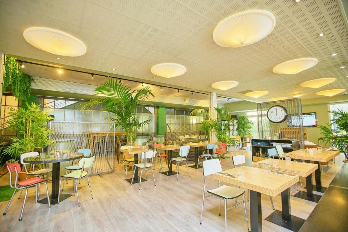 Restaurant ou autre lieu de restauration dans l'établissement Sporting House Hôtel