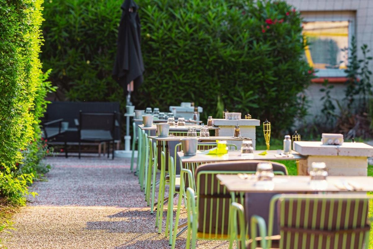 Jardin de l'établissement Sporting House Hôtel