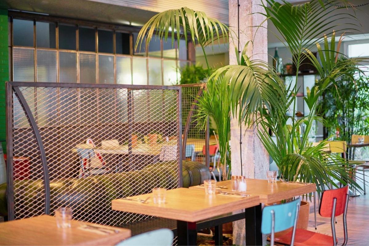 Restaurant ou autre lieu de restauration dans l'établissement Sporting House Hôtel