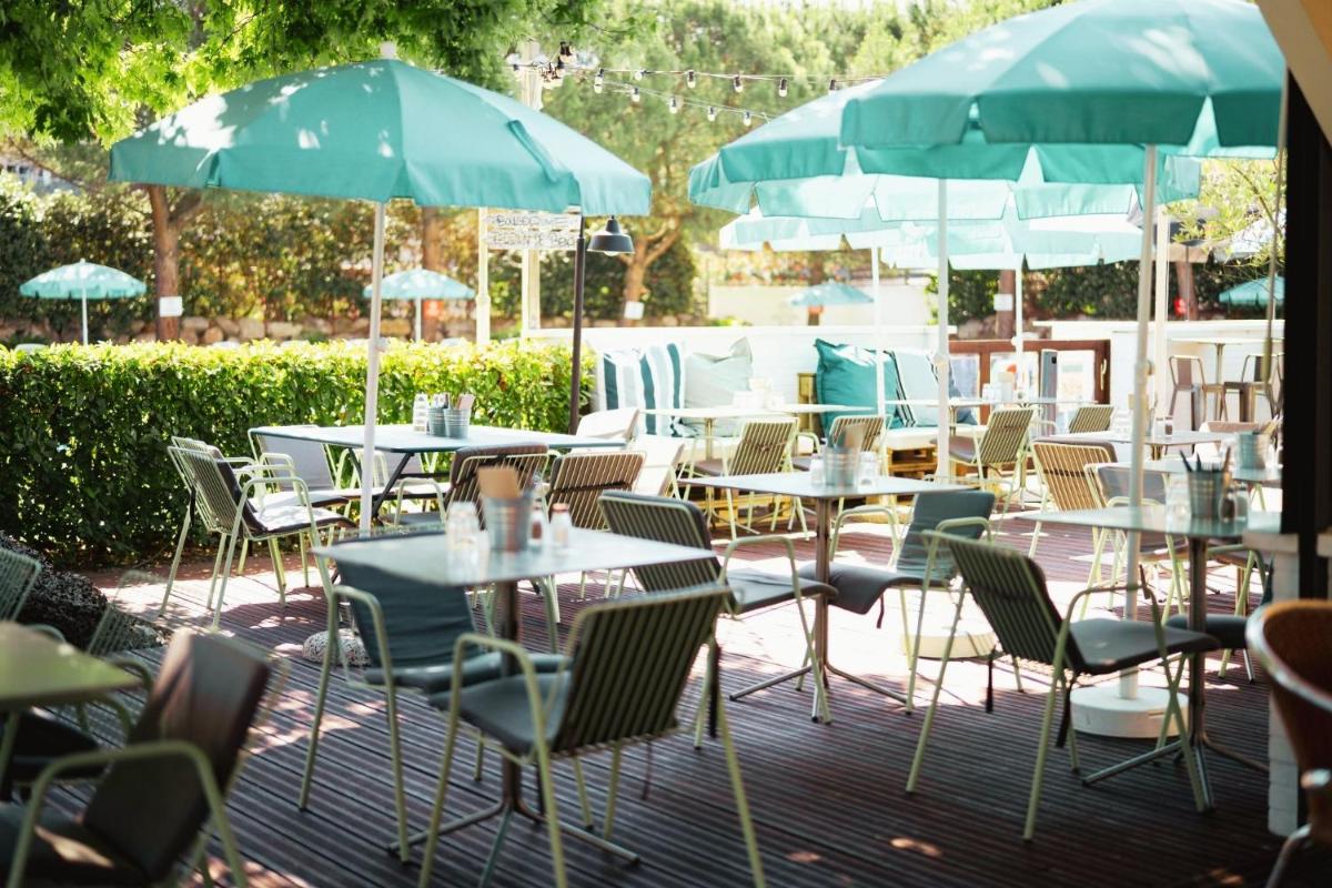 Restaurant ou autre lieu de restauration dans l'établissement Sporting House Hôtel