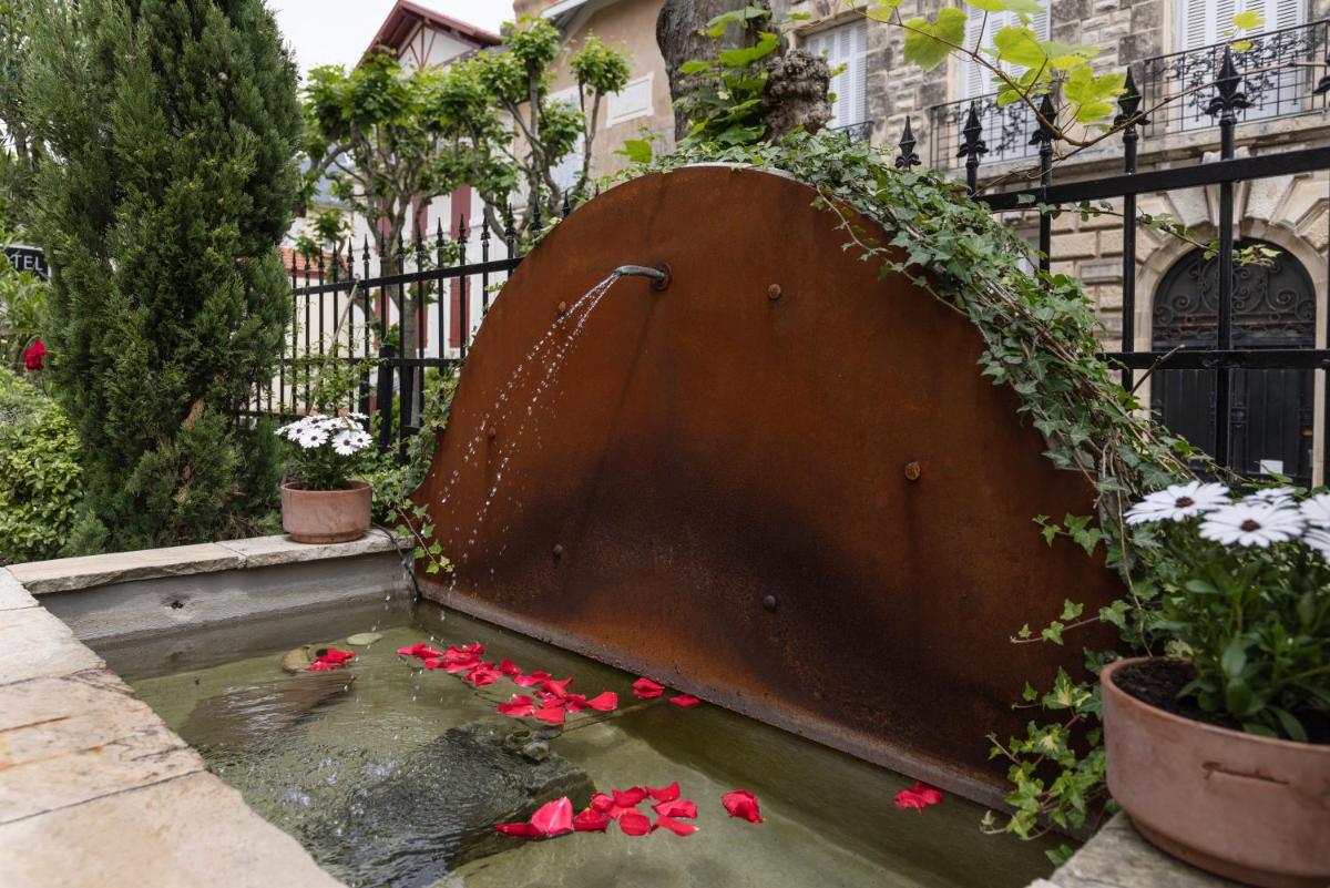 Jardin de l'établissement Hôtel & Espace Bien-être La Maison du Lierre