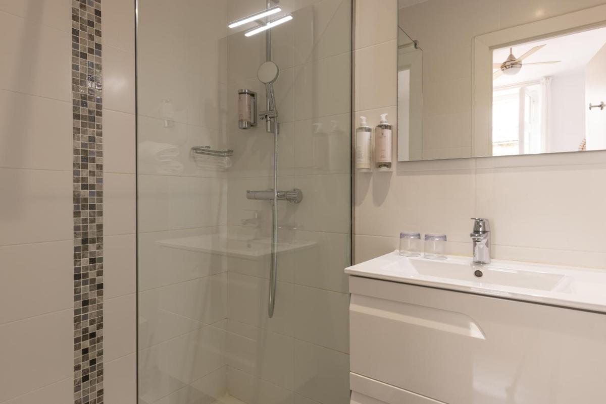Salle de bains dans l'établissement Hôtel & Espace Bien-être La Maison du Lierre