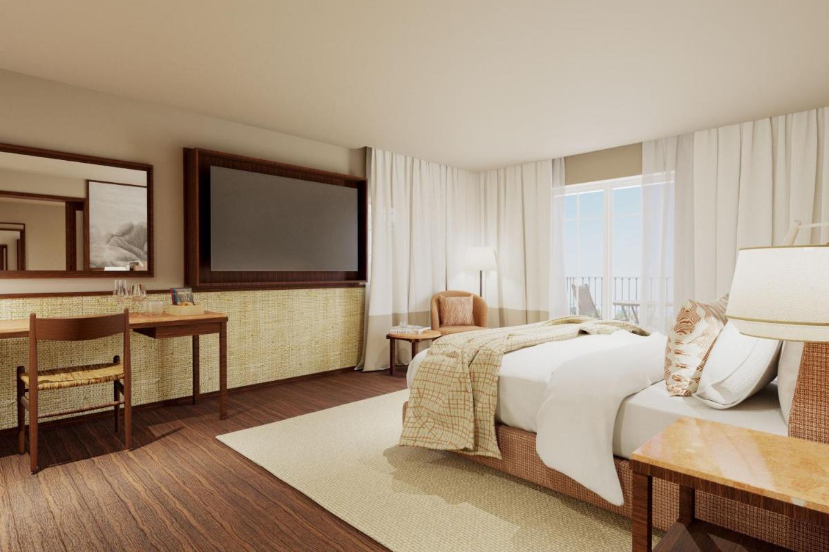 Uma cama ou camas num quarto em Domes Lake Algarve, Autograph Collection