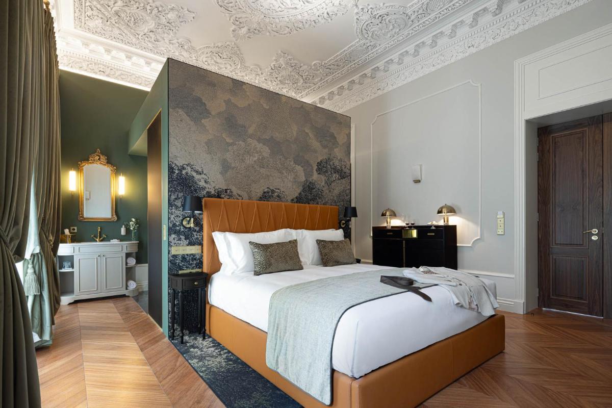 Uma cama ou camas num quarto em MS Collection Aveiro - Palacete Valdemouro