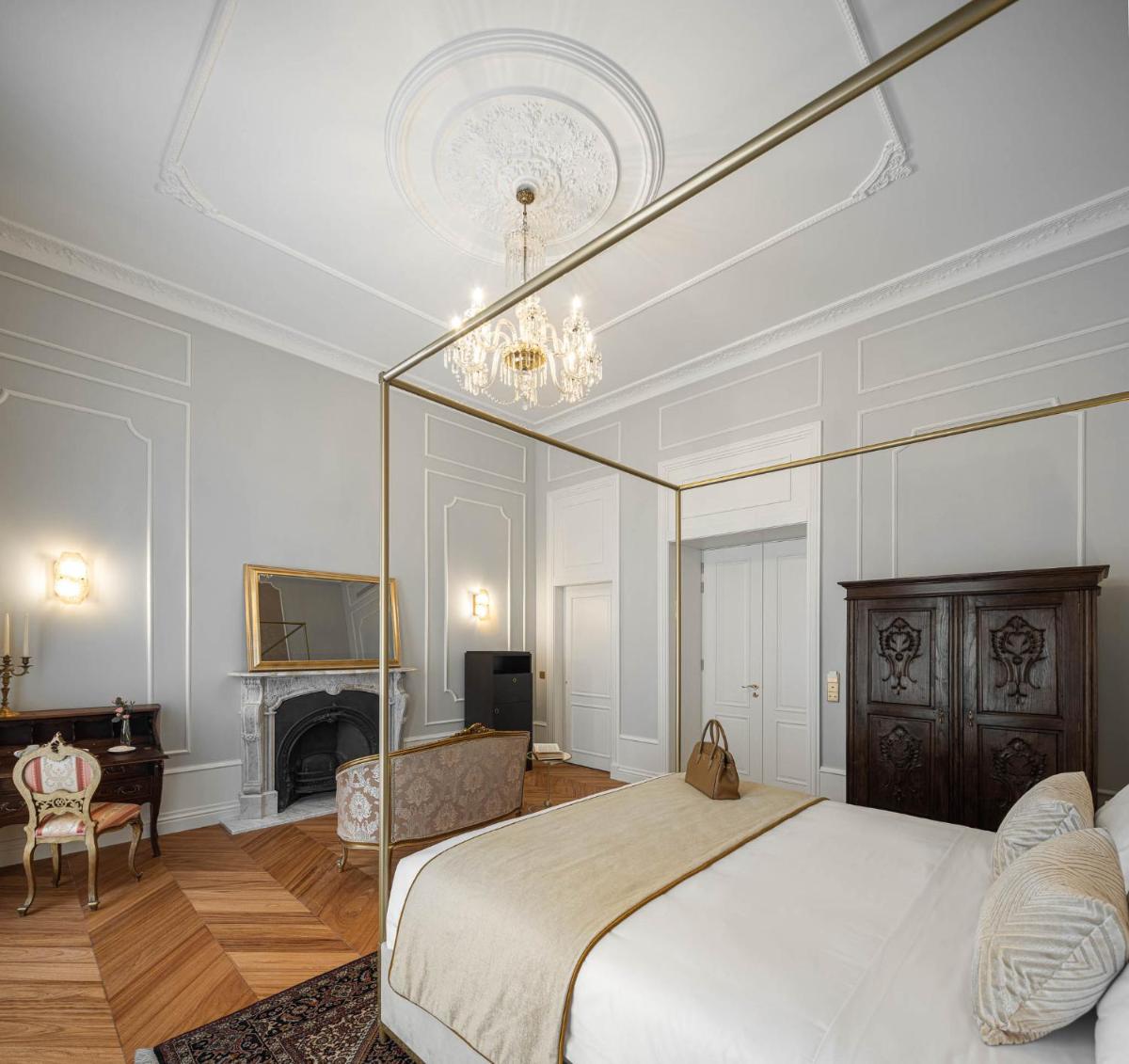 Uma cama ou camas num quarto em MS Collection Aveiro - Palacete Valdemouro
