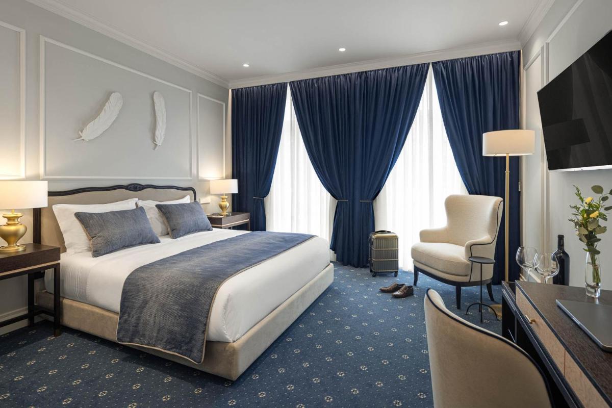 Uma cama ou camas num quarto em MS Collection Aveiro - Palacete Valdemouro