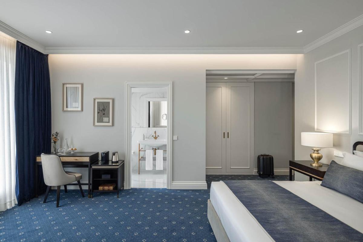 Uma cama ou camas num quarto em MS Collection Aveiro - Palacete Valdemouro