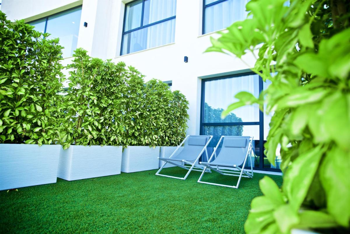 Jardín al aire libre en Syncrosfera Fitness & Spa Health Hotel Boutique